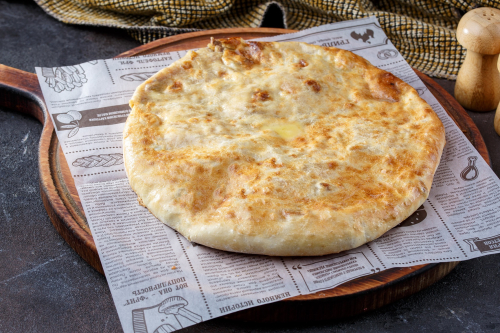 Пирог осетинский с томленной говядиной сыром и картофелем